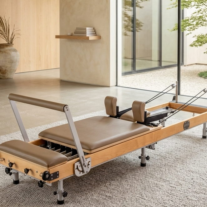 A wooden foldable reformer in a modern light filled living room setting.