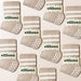 Pattern of beige socks with white stripes and 'elliosa' branding on a beige background.
