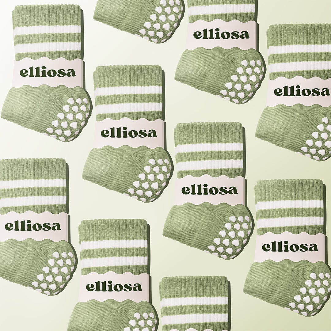 Pattern of green socks with white stripes and text on a light green background