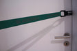 Close up of the Blackroll Hook in use in the door with a resistance band attached.