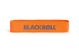 An orange blackroll loop resistance band on it's side with blackroll logo visible.