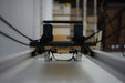 Close-up of a Queen reformer from inside the frame on a blurred background
