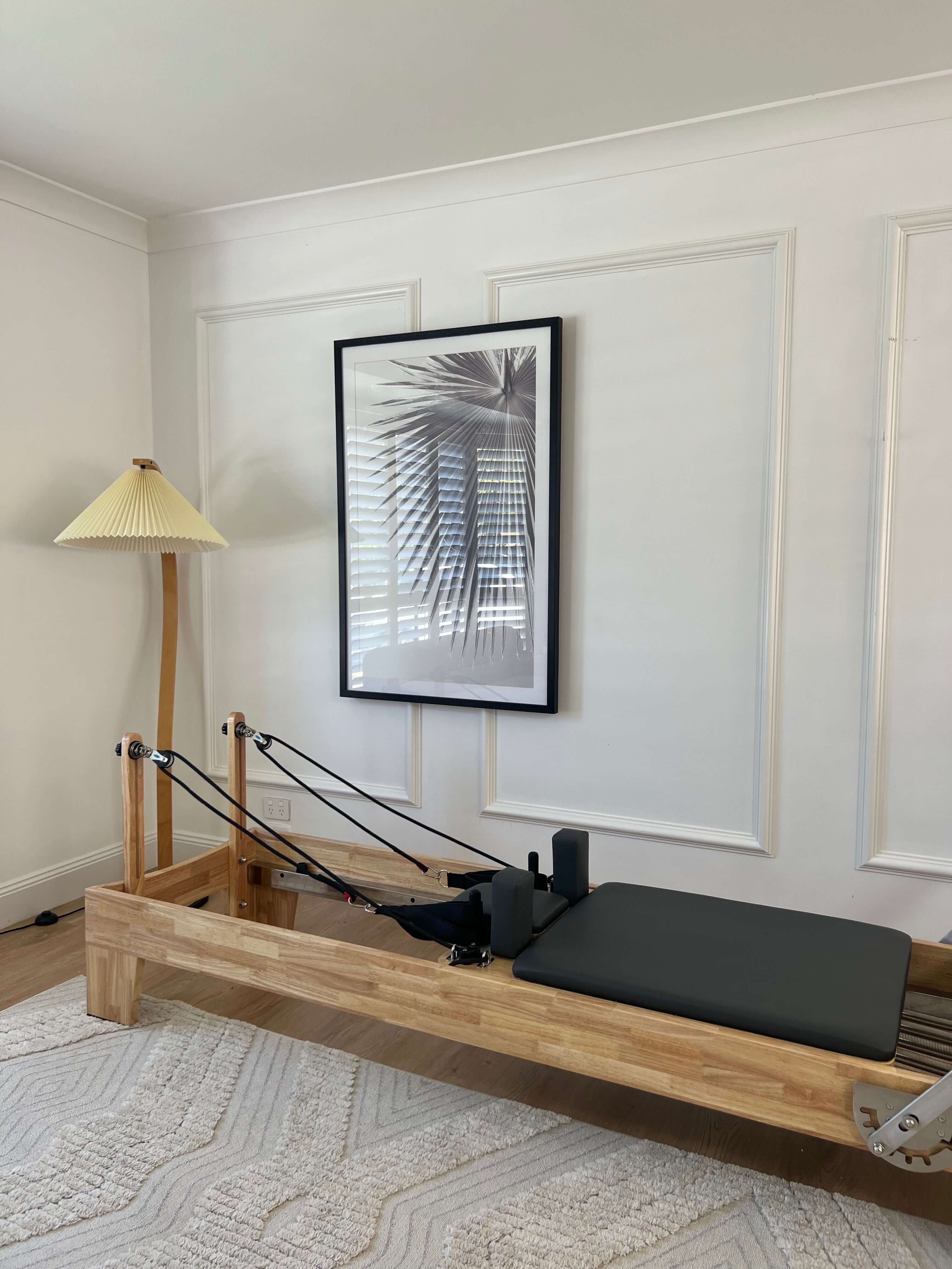 Core Collab Eco Reformer with Beechwood frame and charcoal upholstery in a living room setting.