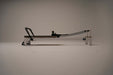 Core Collab Queen Studio Pilates reformer side view on a white background.