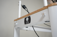 close up of the queen Pilates reformer frame from the end with the core collab logo showing.