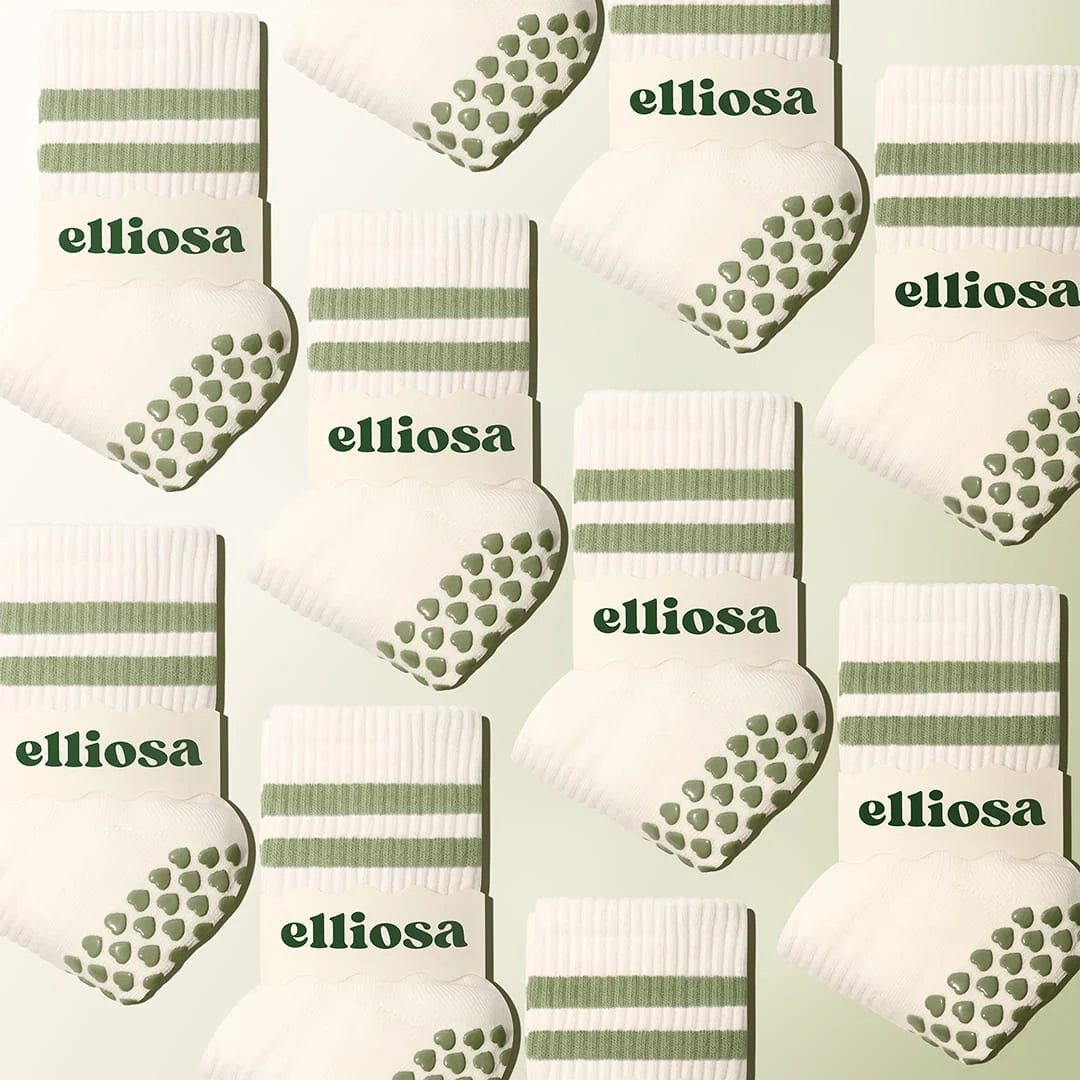 Elliosa Dual Direction Grip Socks in matcha cream laid in a pattern.