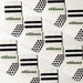 Elliosa dual direction grip socks in coconut cream in a pattern
