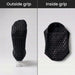 Bow shaped black grips on outside of the sole of the sock and circle grips on the inside sole of the sock to stop slipping.