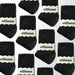 Elliosa dual direction black basic grip socks arranged in a pattern
