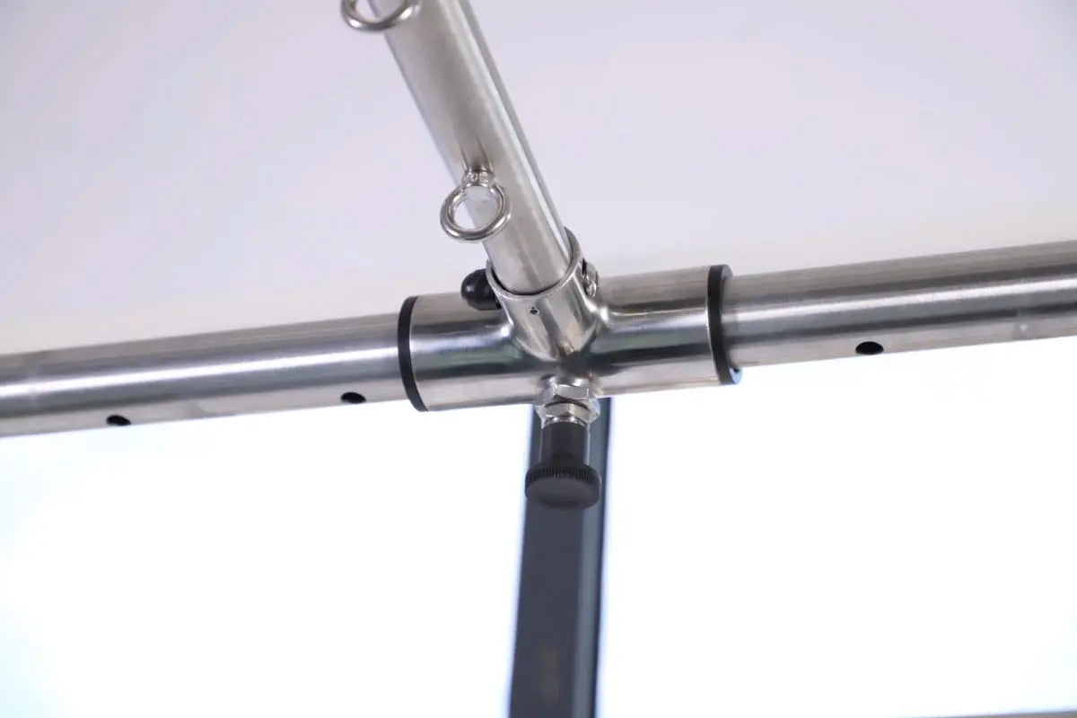 Close up of cross bar at top of Cadillac Table.