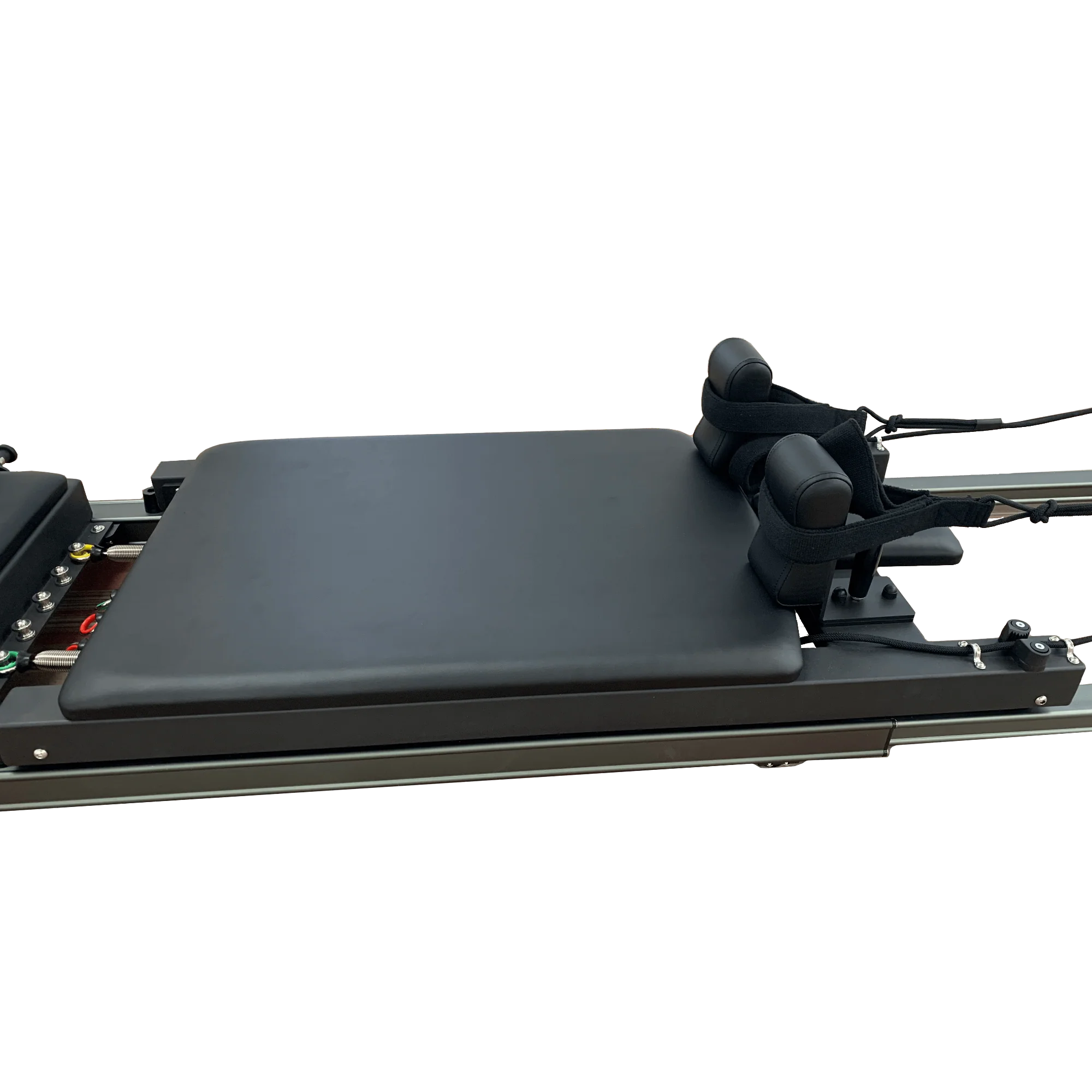 black pilates reformer close up of the carriage bed.