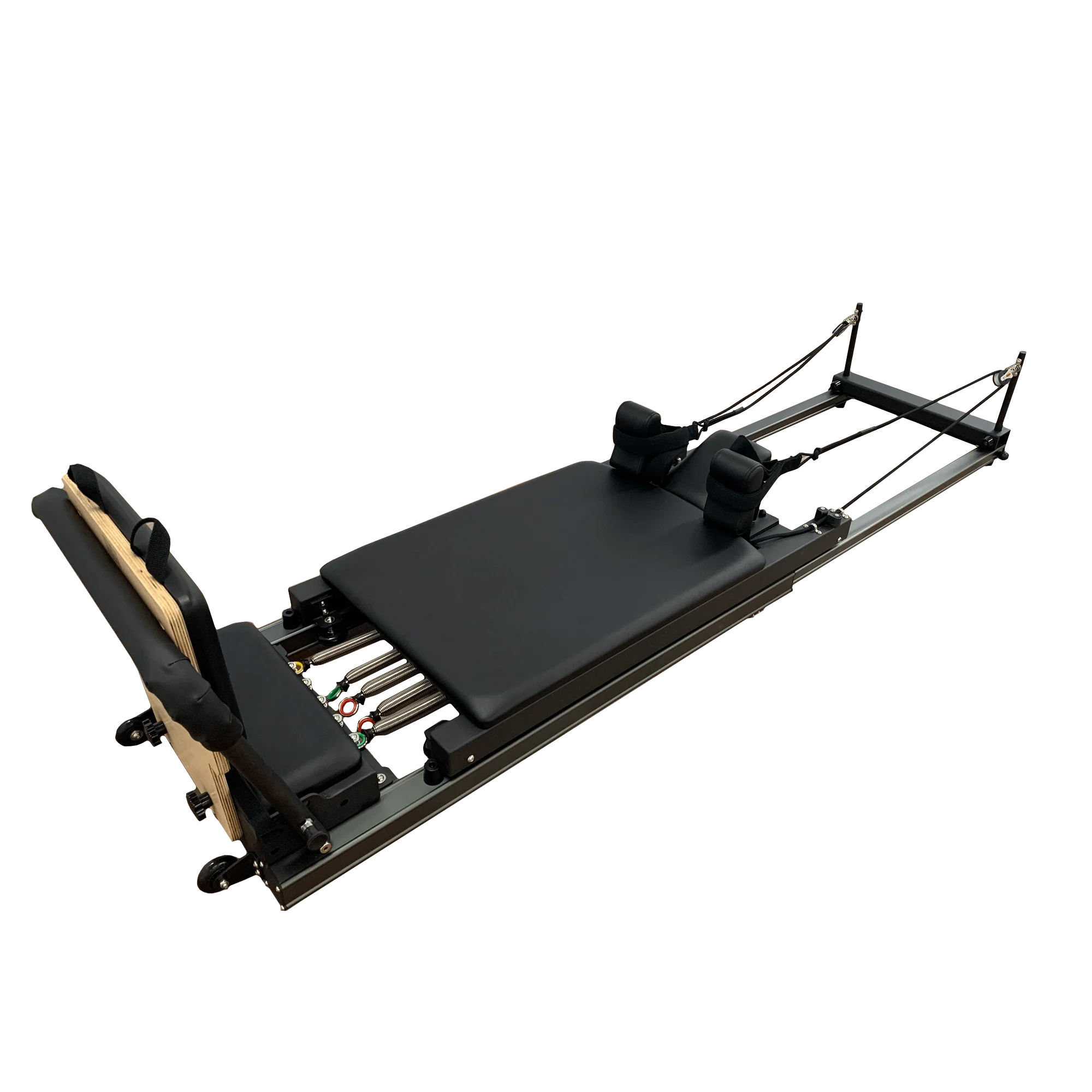 Black pilates reformer with view of the springs, on a white background.