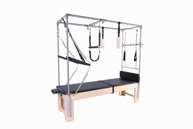Clinical Pilates cadillac table made of Canadian Maple wood with full trapeze and attachments, with black upholstery.