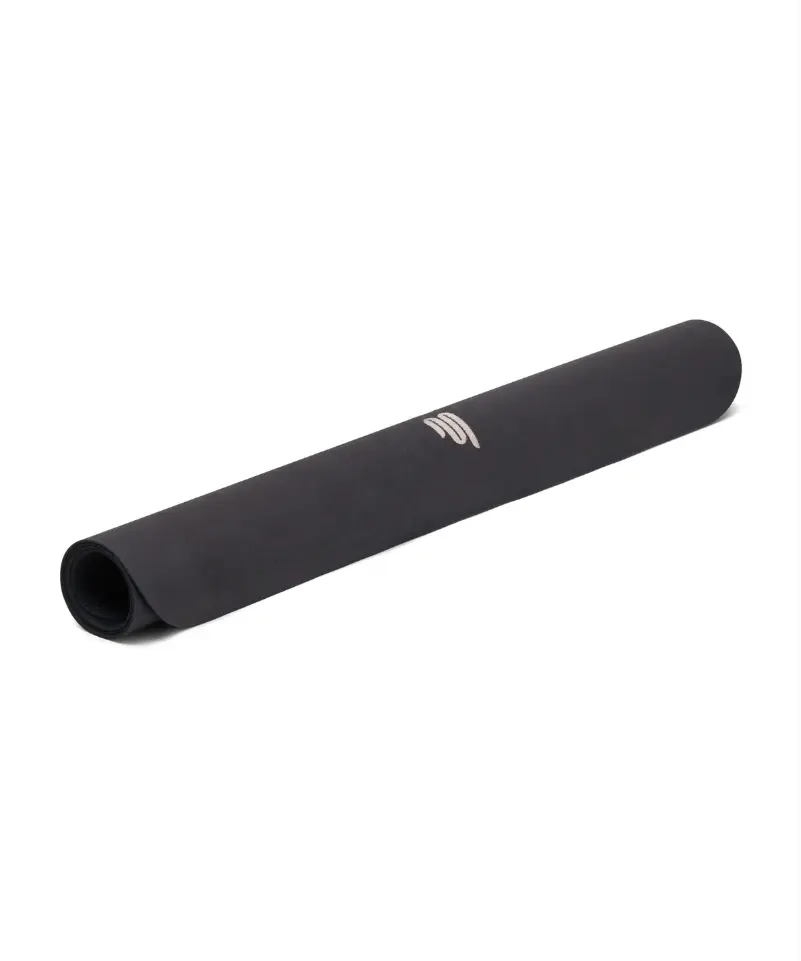 Full view of a black reformer pilates mat rolled up with logo visible in the middle.