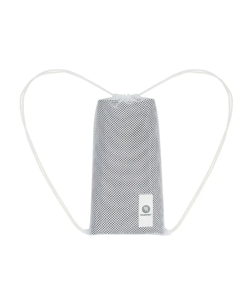 White mesh bag with handles containing a folded MoveActive reformer mat.