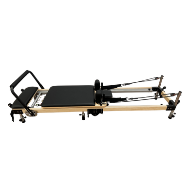 Lightweight pilates reformer with black upholstery.