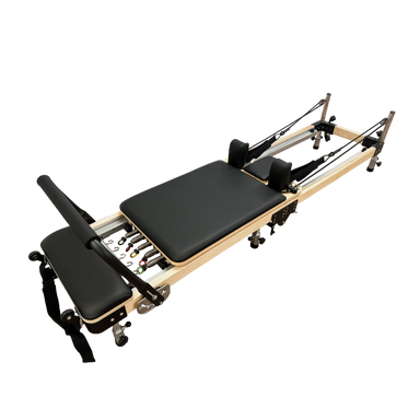 Lightweight foldable pilates reformer with black upholstery.