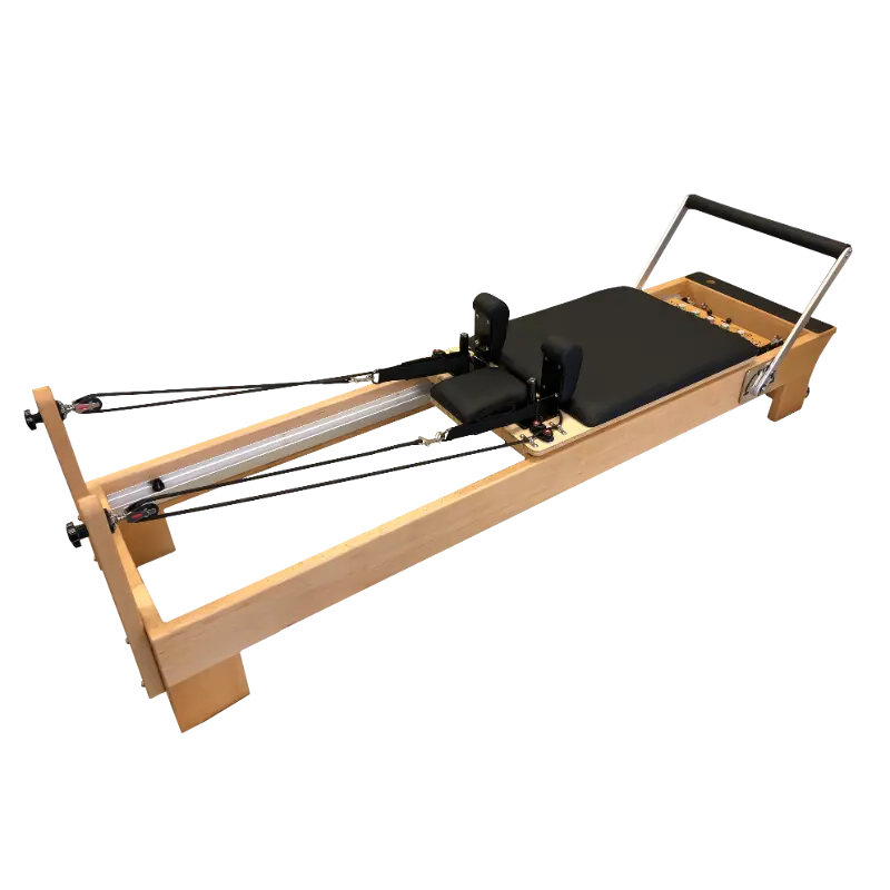 PP-03 light coloured wooden pilates reformer with black upholstery and adjustable foot bar.