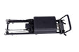 A Fold Lite Pilates reformer machine with a black padded carriage and frame, shown from a side profile view against a solid white background.