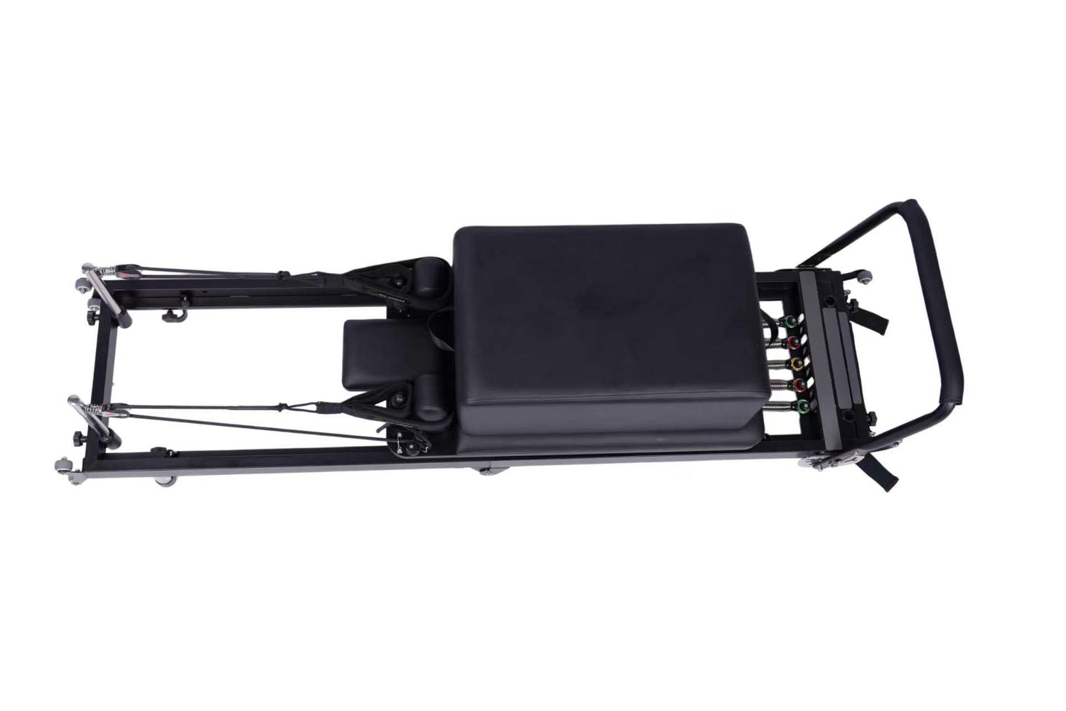 A Fold Lite Pilates reformer machine with a black padded carriage and frame, shown from a side profile view against a solid white background.