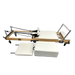 Foldable Pilates reformer machine with sitting box and springboard in white upholstery.