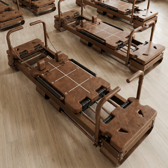 Core Collab Sculptformers shown in brown in a studio setting with arched windows and high ceilings.